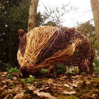 Willow sculpture of giant badger