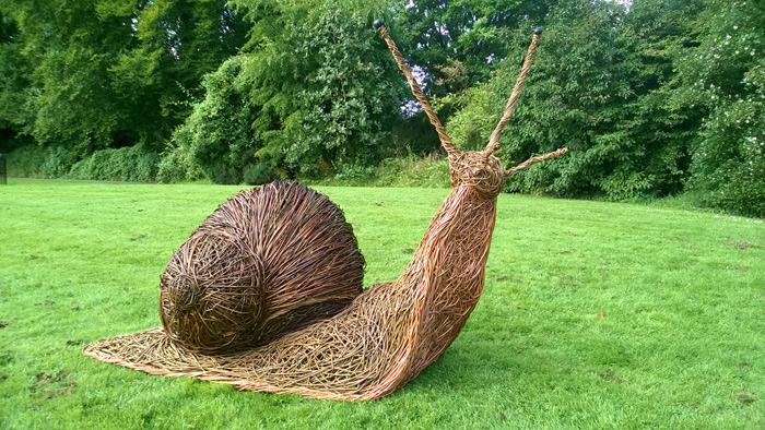 This Giant Snail is 5 foot high and made with various colours of willow and finally varnished to give that slimey feel!