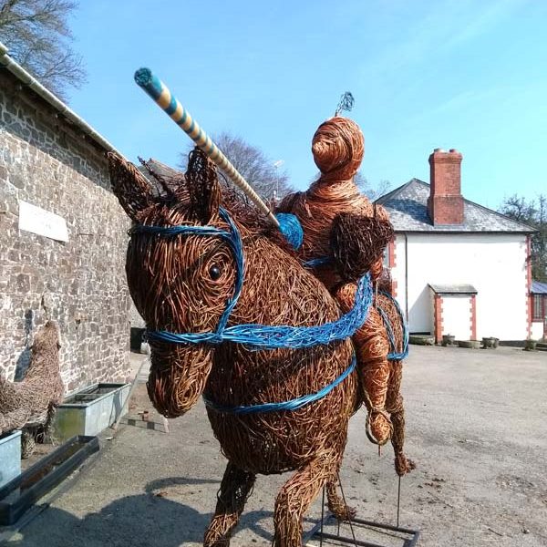 French knight jousting on horseback willow sculpture