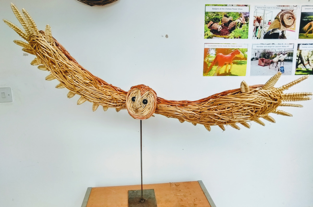flying barn owl willow sculpture